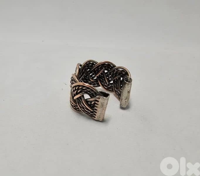 10$ hand braided copper ring 1