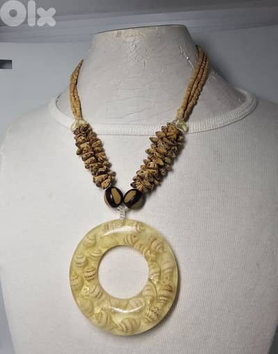 10$ round resin pendant filled with small seashells necklace