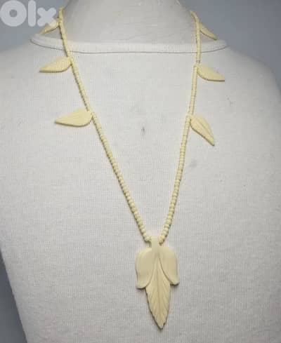 10$ necklace made from camel or bovine bone