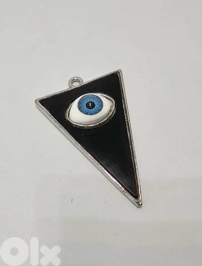 triangle-shaped pendant features a realistic blue eye