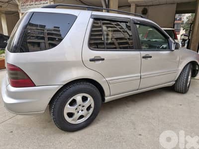 مرسيدس بنز ام ال - كلاس 2003