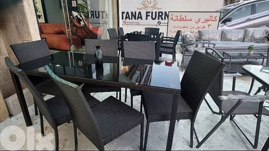 طاولة رزين مع ٦ كراسي