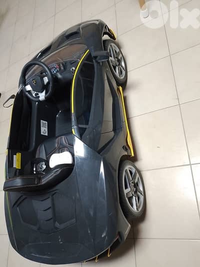 Grey Lamborghini ride on electric car