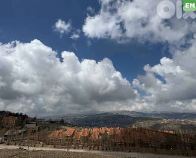 Land in a growing area in Faqra/فقرا/أرض للبيع / REF#EM134716 !