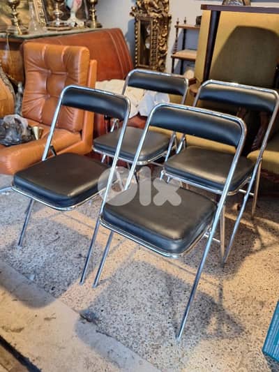 set of 4 leather and chrome foldable chairs