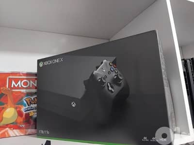Xbox One X complete in box with Original Xbox (Series X)Controller