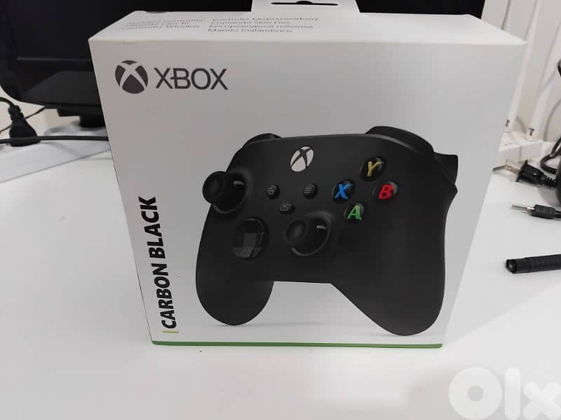 Xbox One X complete in box with Original Xbox (Series X)Controller 1