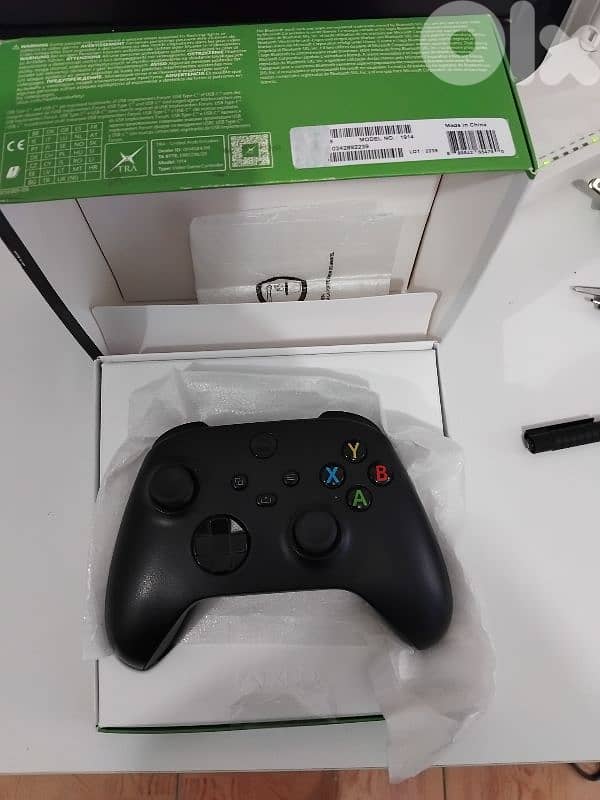 Xbox One X complete in box with Original Xbox (Series X)Controller 2