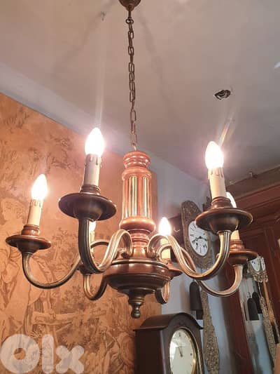 european heavy wood and brass flemish chandelier