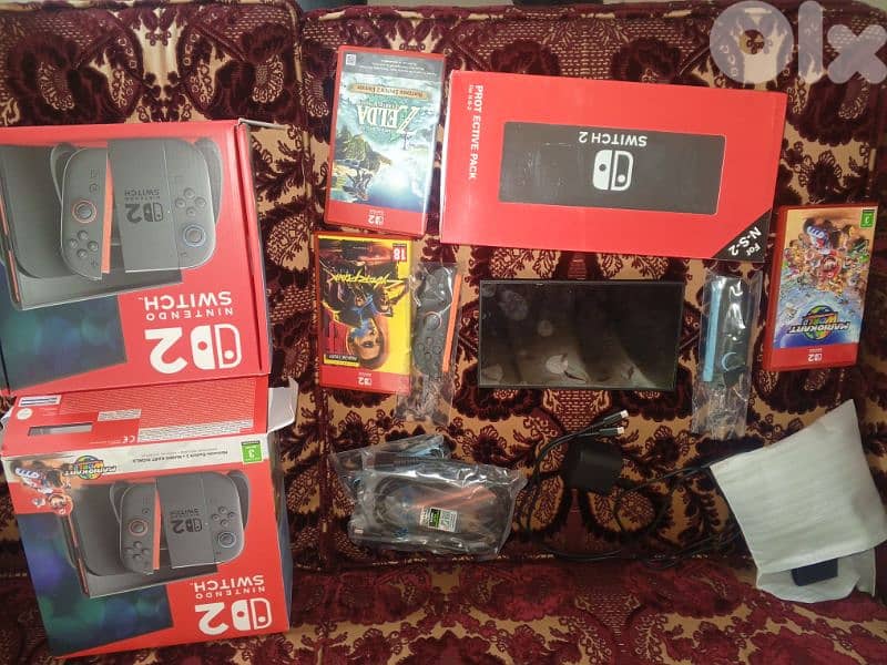 Nintendo switch 2 like new with 3 games screen protec 1