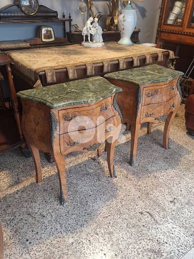 pair of marble top bahue