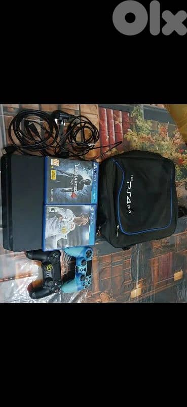 ps4 slim 1tb +2 games +2 controllers+bag