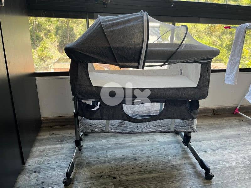 next to bed, baby swing and wearable breast pump 1