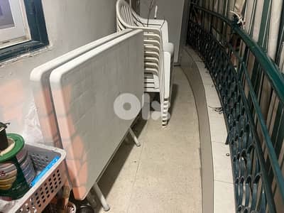 2 Plastic tables with iron base + 8 white plastic chairs