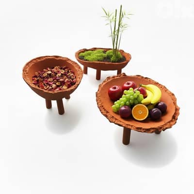 Raised concrete plates and bowls