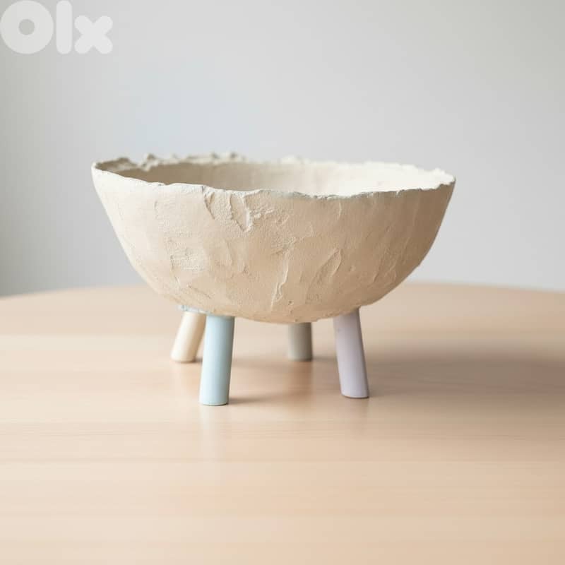 Raised concrete plates and bowls 1