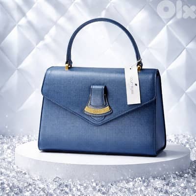 Courrèges Blue Leather handbag for less than half price