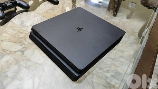 Used PS4 with 2 controllers and a bunch of cd games