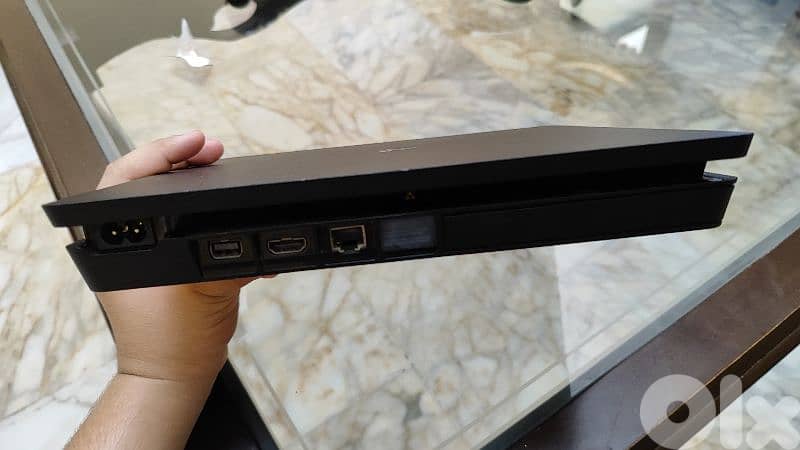 Used PS4 with 2 controllers and a bunch of cd games 3