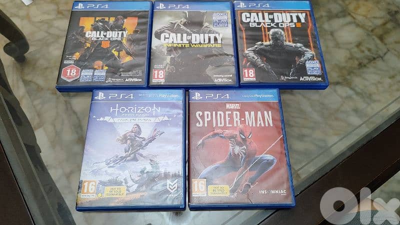 Used PS4 with 2 controllers and a bunch of cd games 8