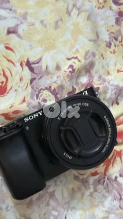 Sony A6000 with 16-55mm 3.5f kit lense and 55-210mm lense