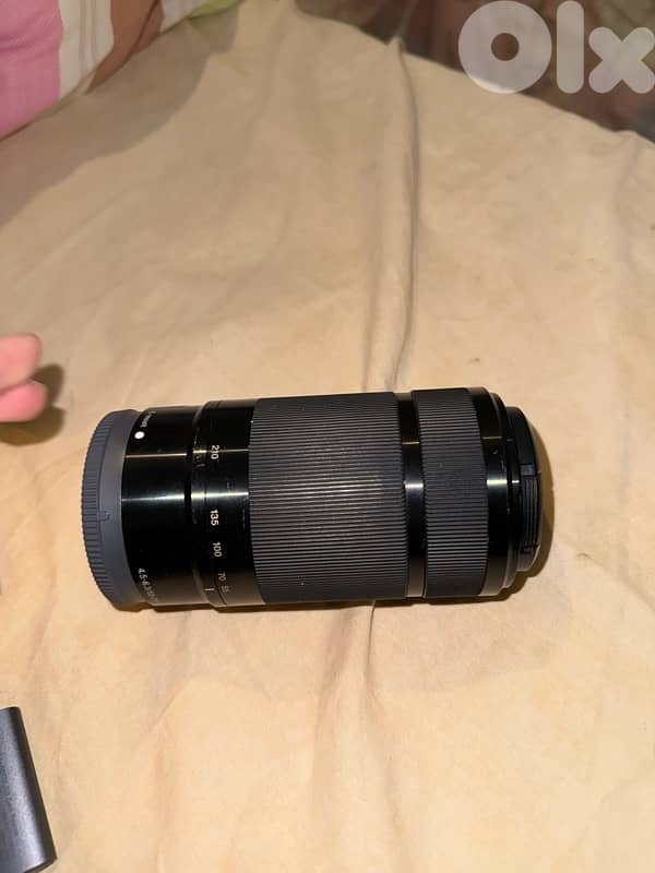 Sony A6000 with 16-55mm 3.5f kit lense and 55-210mm lense 12