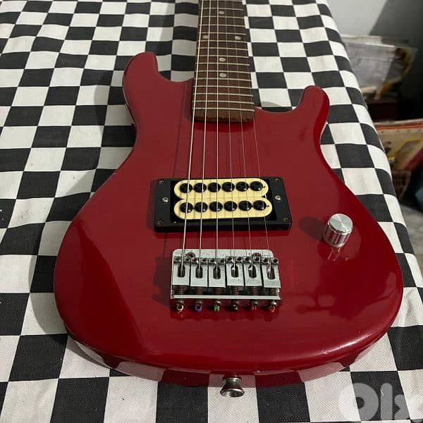 1/2 Electric Guitar 1