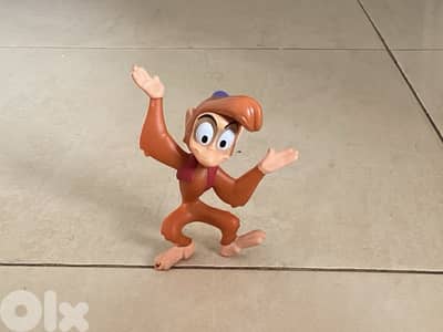 Rare monkey with a blue hat and a red t-shirt