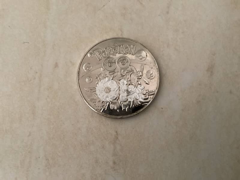Ultra Rare Limited edition Baby Charizard Coin 1