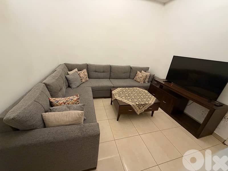 corner with table and Tv unit 1