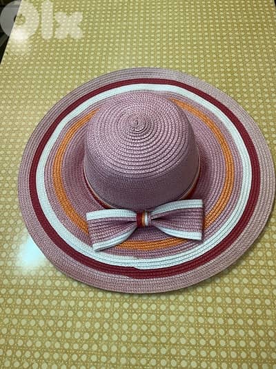 purple and white multi-striped sun woman’s hat