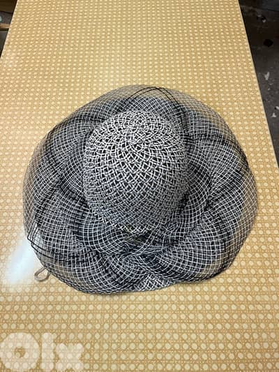 black and grey fascinator-style dress hat