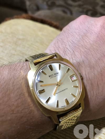 MULTI PRIMA DATOMATIC MANUAL ANTIMAGNETIC SWISS MADE 1970  ساعة ربط