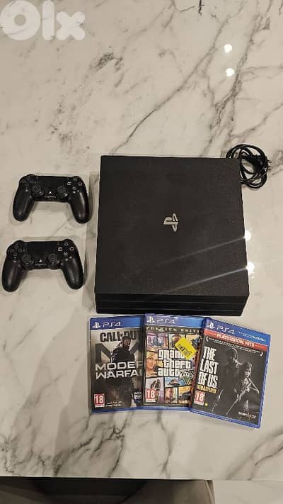PS4 Pro 1TB + 2 Controllers + 3 Games – Very Clean