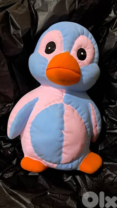 Ceramic penguin piggy bank