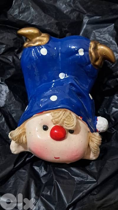 Ceramic upside down clown piggy bank