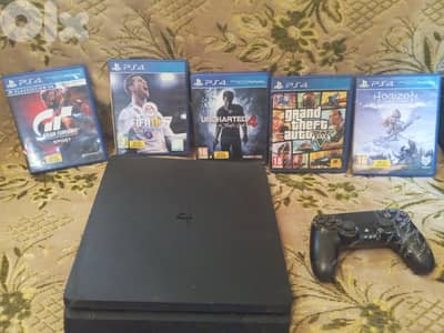 PS4 Slim + Controller + 5 Games + cable  – Excellent Condition