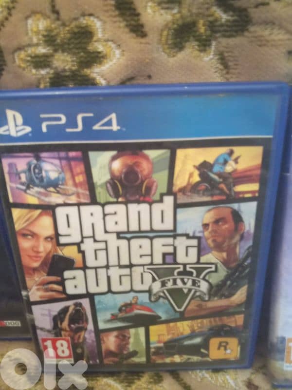 PS4 Slim + Controller + 5 Games + cable  – Excellent Condition 1