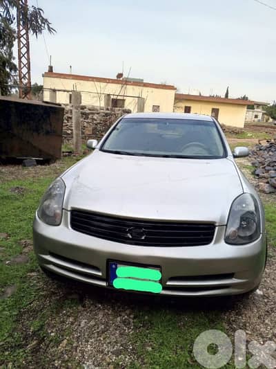 إنفينيتي إي أكس 2003