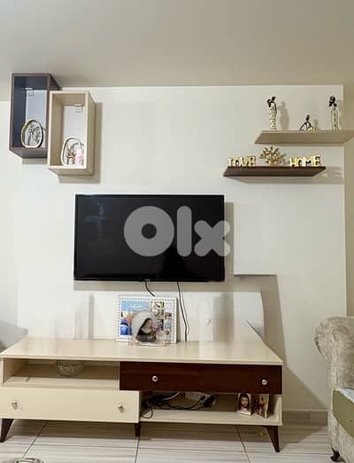 tv unit like new with tv 350$