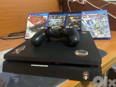 PS4 slim used but in good comdition with 4 games