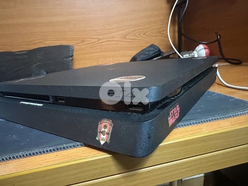 PS4 slim used but in good comdition with 4 games 3