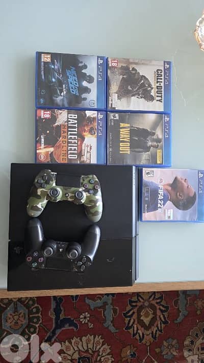 used ps4 for sale with 2 original controllers with 5 games