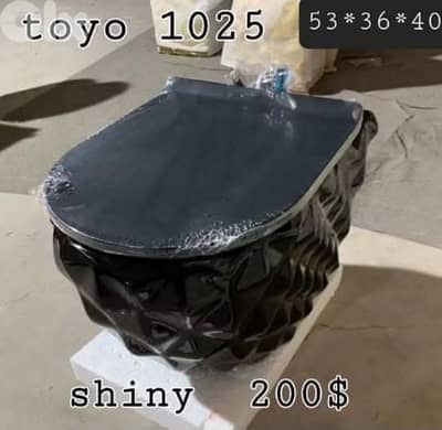 كرسي تعليق أسود. black wallhung toilet