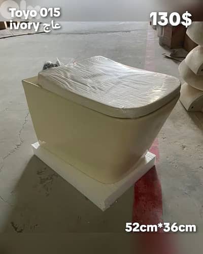 ivory wall hung toilet. كرسي تعليق عاج