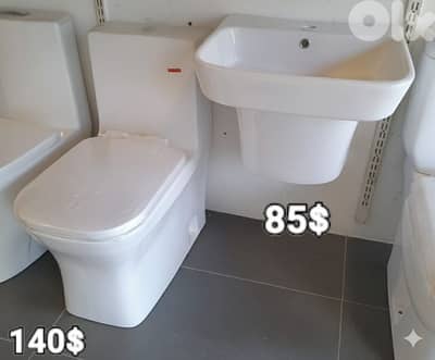 كرسي حمام مع مغسلة. toilet seat and sink