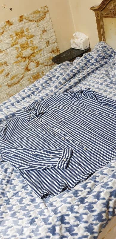 قمصان قياس كبير   لقطة