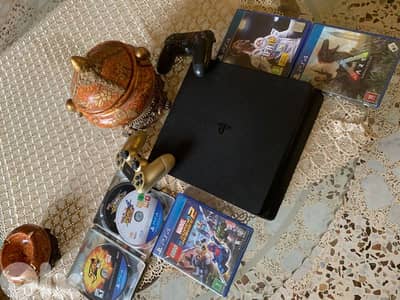 ps4 slim with 6 cds +2 controller