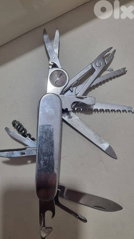 rare Lacoste multi tool in excellent condition 1