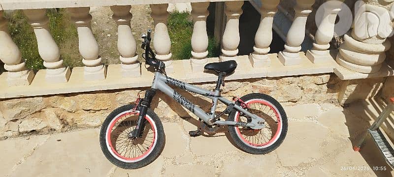 two bicycles and one stand for car 3